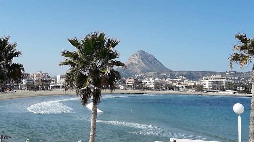 The Arenal beach, Javea. Powder white sand, lots of international restaurants open all year- beautiful views of the montgo mountain.