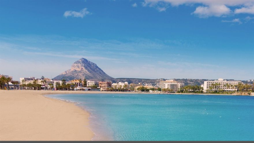 Javea beach- the arenal with the montgo in the background.